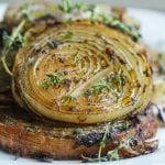 jerk marinated roasted onions topped with fresh thyme