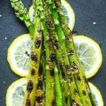 Grilled asparagus on a bed of lemon slices